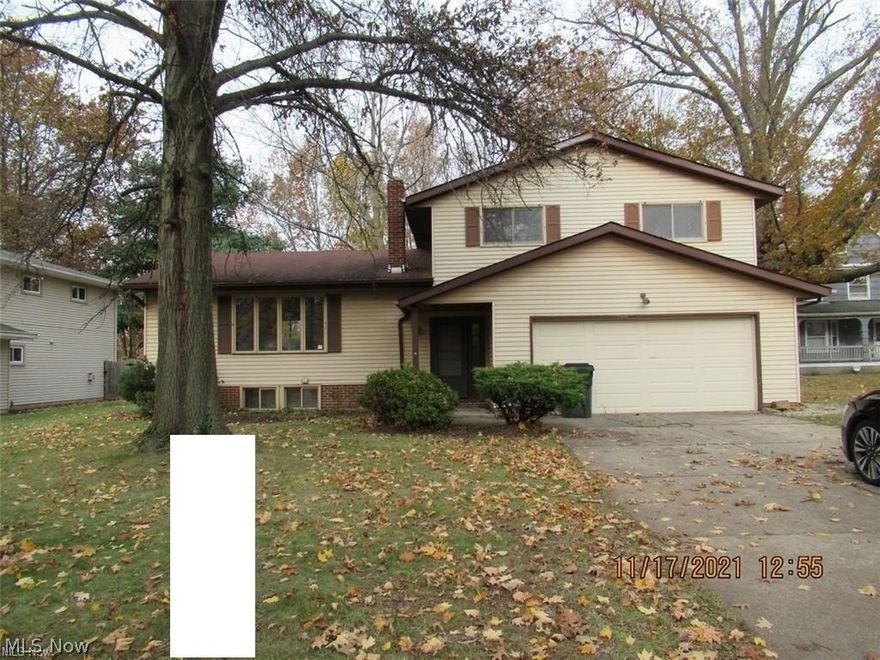 Oh, the possibilities in this spacious split level home! The L-shaped LR/DR lead to the eat-in kitchen. The family room includes a WBFP. Off the family room is a full bath with shower. Three bedrooms and the second full bath are upstairs. The lower level is unfinished and includes the laundry area and lots of storage. Updating is needed throughout. Make this home yours today!