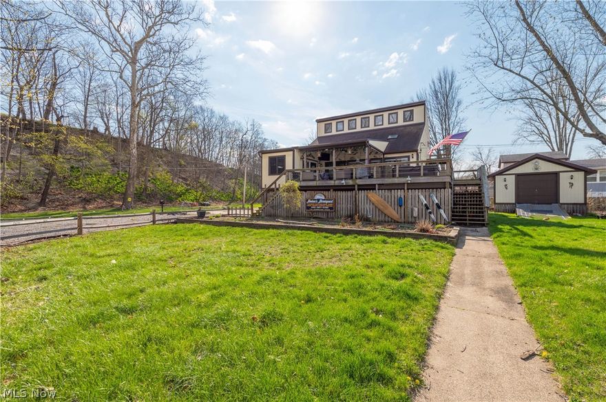 Enjoy riverfront living at its finest in this inviting 4-bedroom, 2-bath home perfectly positioned along the water. The spacious living room flows seamlessly into the kitchen, creating an open and functional layout ideal for everyday living and entertaining. A dedicated wet bar adds the perfect touch for hosting. Step outside to a large deck overlooking the river, complete with a hot tub—your own private retreat to relax and take in the peaceful surroundings. The generous yard, direct water access with a boat slip, and scenic views make every day feel like a getaway. Whether you’re searching for a full-time residence, weekend escape, or investment opportunity, this property offers the perfect blend of comfort, space, and waterfront charm. Metal roof and vinyl siding installed in October 2019 with a 50 year warranty