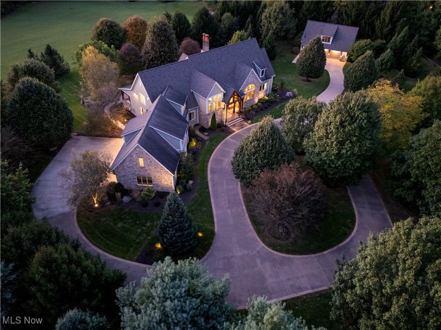 One of Wooster's finest homes. Original Buehler home that butts up to the Buehler's preserve in the back yard which gives you peaceful parklike setting just outside of city limits on nearly 3 acres (which also means no RITA tax) and all of nature's gifts you can take in. Absolutely no expense spared here from the car lifts in the both garages to the thoughtfully designed floor plan giving you over 6,300 square feet of living space inside to enjoy as well as professionally landscaped outdoor living spaces that will have you pinching yourself! All bedrooms are expansive with private bathrooms and walk in closets. Primary bedroom has a private balcony and large his and hers walk in closets and a private bath that makes it feel like spa day...every day. Whole home generator, in home gym, 21' vaulted ceiling in the family room, gourmet kitchen that walks out to to back patio oasis. There are just so many things that you will make you fall in love and with it's custom design, you will not find another home like it anywhere. You will not want to let this one pass you by if you are in the market for a luxurious high end home.