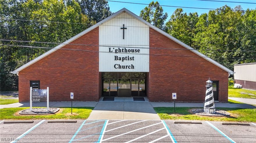 Offering over 13,000 square feet of versatile space, this well-maintained property is currently operating as a church but is easily adaptable for a wide range of uses. Situated in a high-traffic area with excellent visibility and convenient access to downtown, the location enhances both accessibility and exposure. The main building includes a large sanctuary (pews convey with purchase), numerous classrooms, two office spaces and restrooms. A spacious lower level provides additional square footage with the potential to be finished for classrooms, kitchens, or expanded meeting areas. A separate building, formerly used for classrooms and fellowship gatherings, adds even more flexibility for future use. With its size, layout, and prime location, this property is ideal for a variety of ventures—school, daycare, community center, restaurant, or other commercial enterprises. The possibilities are extensive, making this a rare opportunity in a sought-after area.