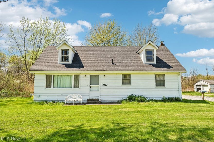 If you've been dreaming of space, privacy, and endless possibilities-this is it. Nestled on nearly 34 acres, this charming Cape Cod offers the perfect blend of comfort and opportunity. Inside, you'll find hardwood floors throughout, a full basement, and a massive second level (over 600 Sq Ft) just waiting to become your dream primary suite, studio, or retreat. Step out through the French doors onto the back deck and take in the peaceful surroundings-this is country living at its best but still close to all the amenities you love. Beyond the home, the property truly shines. A separate mobile home with recent updates provides additional living or income potential, while the outbuildings-including a barn with a newly updated upper level-open the door for hobbies, storage, or creative use. With a newer roof, updated mechanicals, and gas available at the road, much of the heavy lifting is already done. All of this is just minutes from Geneva-on-the-Lake, giving you the perfect balance of seclusion and convenience. Opportunities like this don't come around often.