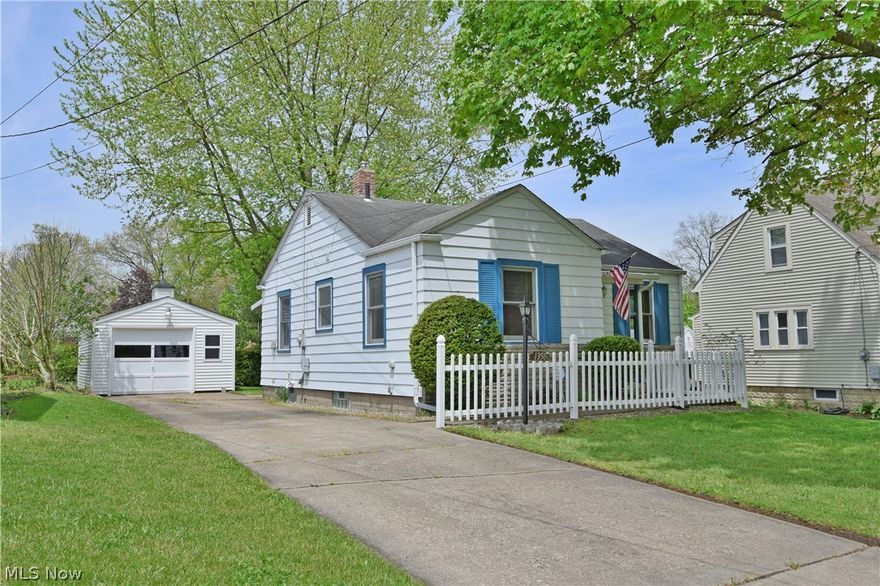 Welcome home to this freshly remodeled two-bedroom home, offering picture perfect living space all wrapped up in a tidy package! This cozy layout offers plenty of space and good looks throughout as the handsome white and blue exterior is sure to draw you in. A white picket fence leads to the covered front entry way as you step inside to the spacious carpeted living room. Natural light pours in from the surrounding windows while a tall sculpted archway yields the formal dining area, trimmed in tasteful two tone with an accented chair rail. The workable kitchen combined maximum efficiency and cabinet space alike while rear patio access is just step away. Opposite the home, both ample bedrooms branch away from a full central bath shod in elegant tile work. Built in hallway cabinets add to the available closet space. Downstairs, a sealed and painted basement offers both dry storage, workshop area, utilities and a finished bonus room for an easy third bedroom.