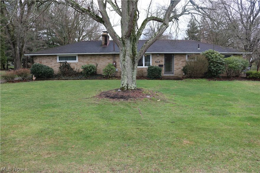 3 bedroom, 2 full bathroom brick ranch located in the highly sought after Uniontown/Lake Township area (Lake schools)!  Sitting in a quiet neighborhood on almost a half acre lot, this home has so much to offer.  Just inside the front door you walk into a large living area with an abundance of natural light, original hardwood flooring, and a fireplace to keep you warm on those cold nights, or just for some additional ambiance when you are trying to relax after a long day.  Next to the living room you will find a good size, open kitchen area with plenty of counter space and even more storage..and there is also a separate dining room area with a breakfast bar and large window overlooking the private back yard.  The other side of the house offers 3 good size bedrooms, a full bathroom with double vanity, and even more storage.  This home offers a little bit of a unique touch..having a spiral staircase that goes from the back of the living room down to the lower level where you will find a huge great room (also accessible from the garage) that also offers a second fireplace.   On the lower level you will find a second full bathroom, and large utility/laundry room with plenty of room to move around. 
The outside of the home offers a private setting, low maintenance brick exterior, large, almost half acre lot, private parking behind the house, and rear load garage.  Updates include, electric (150 amp), vinyl windows, refrigerator, and hot water tank (2018).
