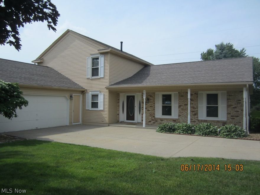 Beautifully maintained split level situated on a half acre, manicured corner lot!  This home boasts of a spacious, open floor plan, eat-in kitchen,  large family room with wood burning fireplace and wet bar.   The  large bedrooms  feature spacious closets with plenty of other storage throughout.  A bonus room on the first floor is ideal for an office or playroom which is off of the laundry area.  Many mechanicals updated including:  hot water tank; furnace; air conditioning and roof.   Walking distance to the Excellent Rated Medina City Schools.  
This home is a definite must see!