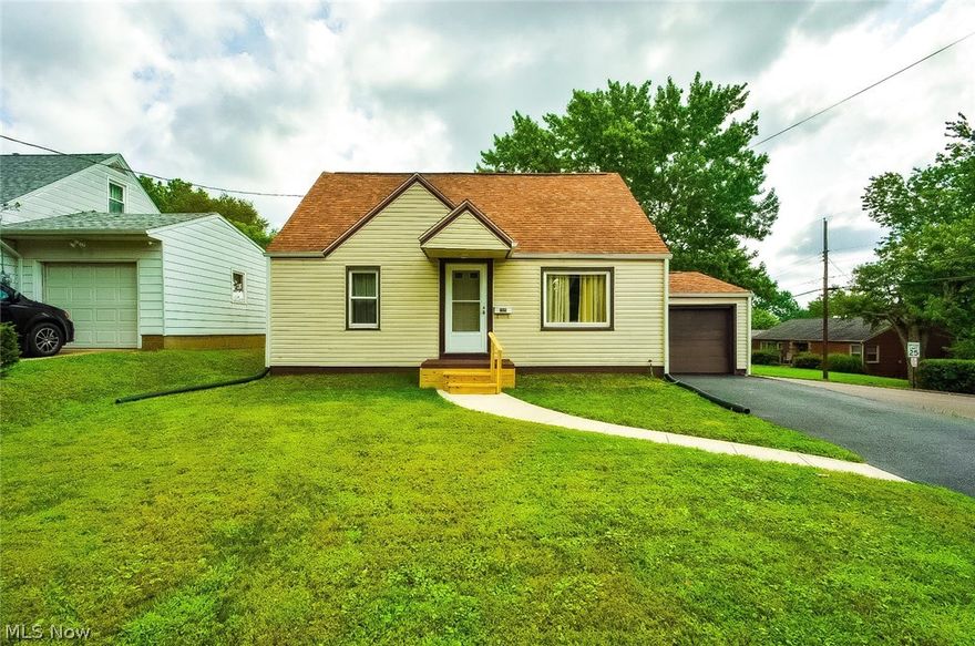 Darling property, better than new.  Living room with picture window, eat in kitchen with all appliances, 2 bedrooms on the first floor, one large bedroom on the 2nd floor.  The almost unending list of updates include, new central air, new high efficiency furnace, new hot water heater.  Newer windows, glass block windows in basement.  New electrical box and wiring, all new plumbing including drains and toilet.   New asphalt driveway,  new "membrane" around foundation, new concrete sidewalks, new entry doors at front and garage, new steps at front entry.  New under layment to living room floor,  new bamboo floors in kitchen, new carpet on first floor, fresh paint throughout.  Partially finished basement with additional living space.  Attached garage with mechanical chair lift and platform.  Beautifully landscaped and ready for a new owner.  Property is not a flip, owner has lived here for 29+ years.  Don't miss this one!