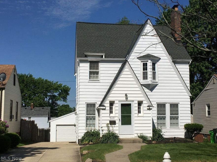 This beautifully renovated Tudor Colonial boasts 4 bedrooms, 1 1/2 baths, a large living and dining room, and a finished basement. Enjoy views of your back yard and rear deck,  from your cute second floor porch. You can also enjoy views of your back yard from the dining room's beautiful bay window. This home has been updated with fresh paint, new carpet, newer roof, and the kitchen has been remodeled. Enjoy the privacy of a one way street, just minutes away from shopping and restaurants. Call this home yours!