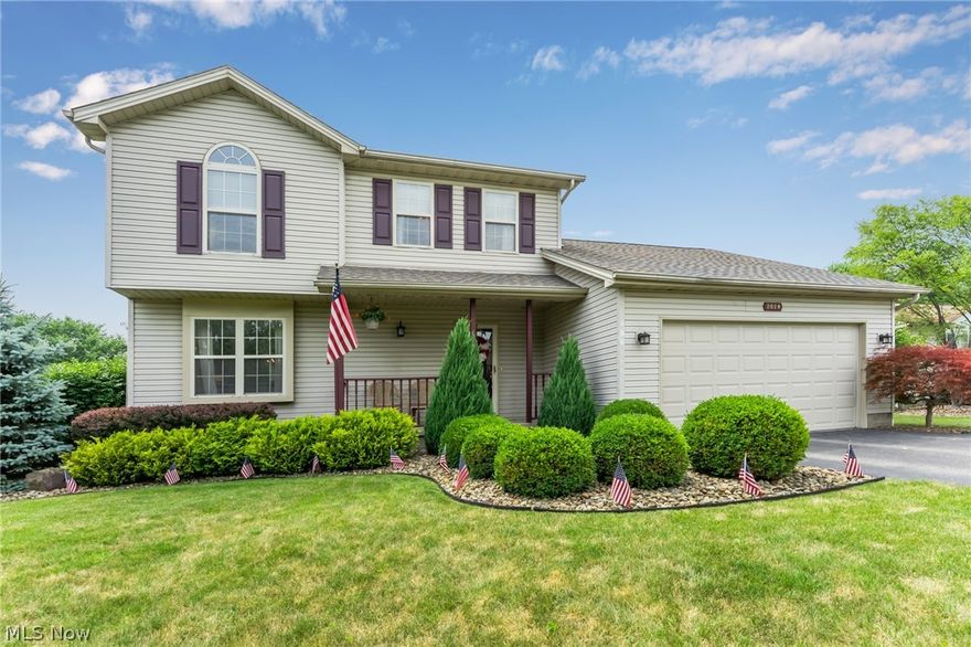 Updated home in Austintown school district! The roof is less than 5 years, AC unit is 3 years, new garage door and opener in 2018, hot water tank is less than 6 years- this home has been well maintained! Beautiful landscaping and a fully fenced in backyard with two direct access gates to the bike trail. A full kitchen remodel completed in 2018 is one of many highlights of this home- granite counter tops and plenty of storage within the hickory cabinets with the quiet close feature. The dining room boasts plenty of space for entertaining. Family Room is located off kitchen and features a gas fireplace, cathedral ceiling, and sliding glass doors that take you to the large deck. An updated half bath with granite composite vanity top & hickory vanity, completes the first floor. The entire first floor has newer laminate Traffic Master flooring. Upstairs you will find 3 bedrooms, a guest bath  with tub/shower, and an inviting master bedroom with cathedral ceiling, en suite bath and a walk-in