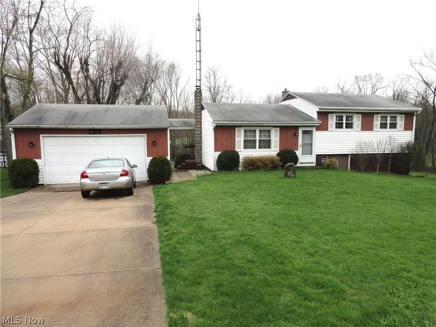 Perfect opportunity for a flip house or fixer-upper.  Just bring your paint, polish and cosmetic decorating skills.  Nice large private lot, oversized two car Garage and perfect future Rec Room on Lower Level with walk-out.  See it today!