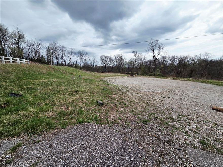 The opportunities are limitless with this convenient location! Located 1 mile from major Interstate 77 & Emerson Ave. Close to restaurants, lodging and shopping in and around north Parkersburg & Vienna. This 2+ acres of commercial land recently surveyed and can include engineered drawings from Pickering & Associates for 28 unit apartment complex possibilities. Plenty of road frontage to make this statement property shine! 

Must call for permission to walk land.