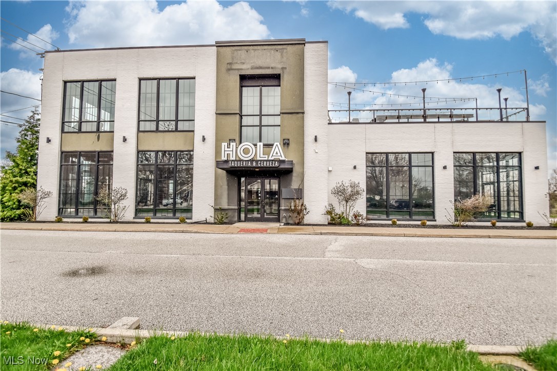 PRIME LOCATION for an exceptional investment opportunity in Historic Downtown Willoughby! This stunning 8,700 SF modern two-story building was constructed in 2016 for a state of the art gastropub, micro brewery, and fine dining restaurant. Perfectly suited for a variety of retail, office, or entertaining business ventures. This venue is fully equipped and located adjacent to the Chagrin River near a high traffic intersection with high visibility on Erie Street off of Route 20. Some other features include a liquor license (A1A, A1C, D6), large open-concept kitchen, 2 full bars, brewery equipment, indoor seating up to 160, private office, restrooms on both levels, an elevator, and exclusive parking lot. The outdoor rooftop patio with fireplace is easily the best in the area, seating up to 75, overlooking the charming community of DTW. Experience Northeast Ohio's favorite destination for restaurants, bars, shopping, and year-round entertainment and activities! Price negotiable and will consider sale, lease, or land contract option with qualified parties.
