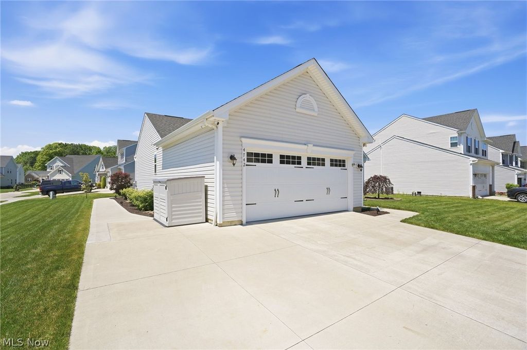 Photo of 4742 Gooseberry KNL, Brimfield, OH 44266 (MLS # 5214123)