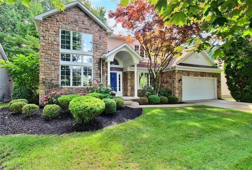 This amazing home in the tranquil community of Bratenahl is now on the market! The welcoming foyer opens to a great room with soaring ceilings and a fireplace. There's a formal dining room perfect for dinner parties. The white eat-in kitchen offers plenty of space, a range hood, wall oven, and a coffee bar with a beverage cooler. The first floor includes a laundry room, powder room, and a spacious den with a see-thru fireplace and built-ins. Upstairs, the primary suite features a walk-in closet and a bathroom with a walk-in shower and jetted tub. Two more bedrooms, a full bathroom, and a private office/bonus room complete the second floor. The finished lower level has a wet bar, rec room, full bath, and ample storage. The home also has a 2-car heated garage, a landscaped yard with flowers, a patio, and stunning pond views. It's close to Newport Harbor and the Shoreby Club, offering dining, swimming, a health club, and more. Plus, it's just minutes from shopping, dining, downtown nightlife, and cultural attractions. This home is a must-see!