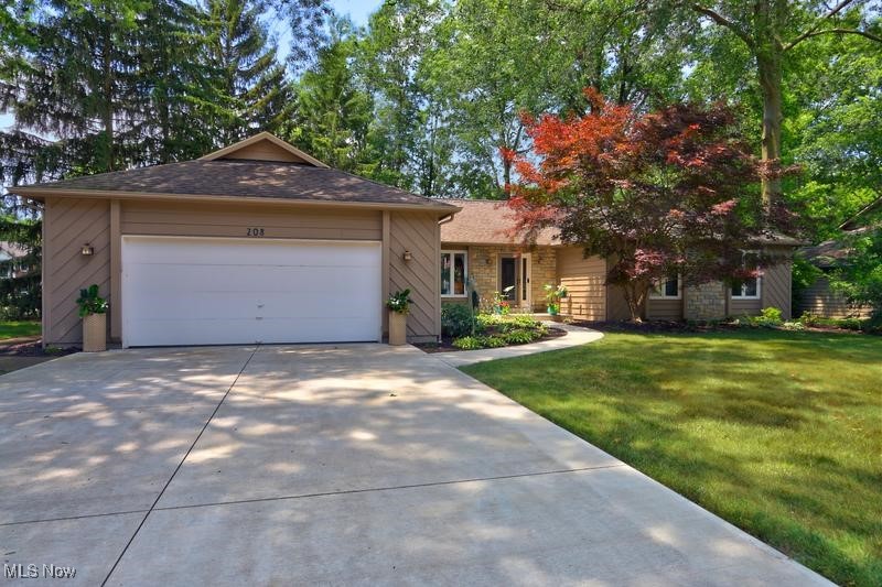 Westwinds rarely available 2,296sf, 4BR, 2-1/2 bath stone and cedar executive ranch. Designed for entertaining, with a spacious vaulted, skylighted living room featuring 2 conversation areas, a huge dining room with a fireplace and sliders to an expansive 576 sqft deck across the back of the house and a renovated, expanded chef's kitchen featuring upgraded stainless steel appliances (including 2 dishwashers and an icemaker) and Caesarstone quartz counters. A full-size laundry room is just off the kitchen, with a sink and added storage along with a half bath and access to the oversized 2-car garage. The bedroom wing includes a large primary suite with en suite bath featuring a dual vanity, jetted tub and separate shower/commode. Each of the secondary bedrooms includes a double closet, plus there's additional linen storage off the bedroom hallway. A large unfinished basement under the main living area has plenty of space for storage or expansion.