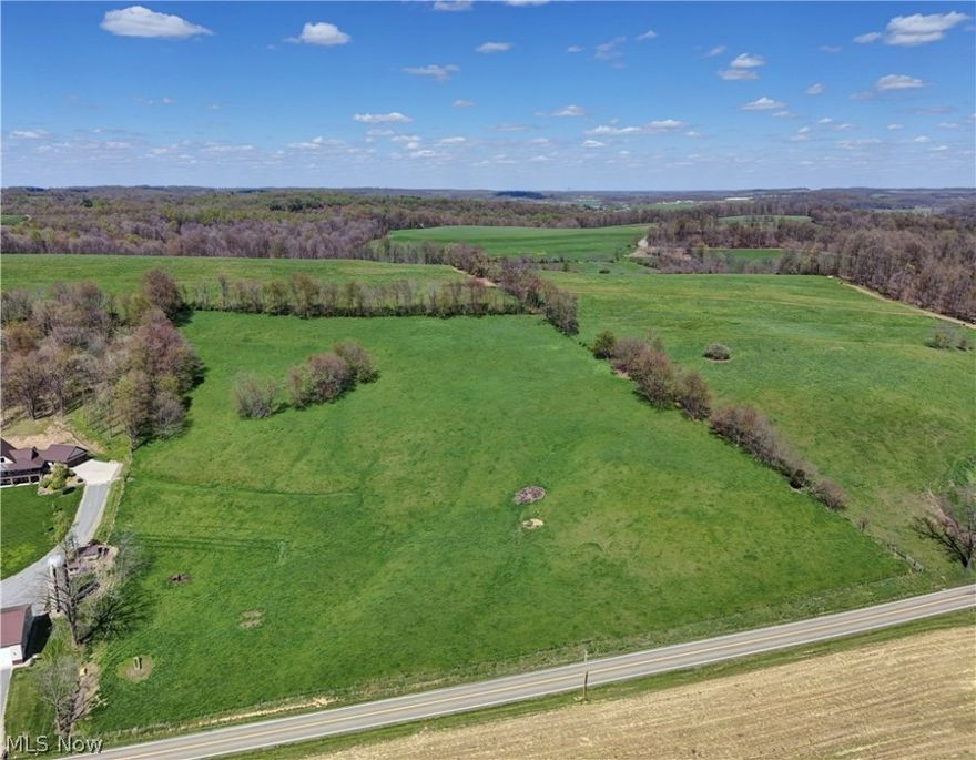Auction Day is Saturday, June 1st, 2024. Real Estate sells at 12:00 PM. Parcel 7: 7.05 Acres. Open Land. 435’ Road Frontage. The acreage is a mix of open pasture, tillable land, and wooded areas with trails and two spring-fed ponds. The hilltop parcels over exceptional views and seclusion.