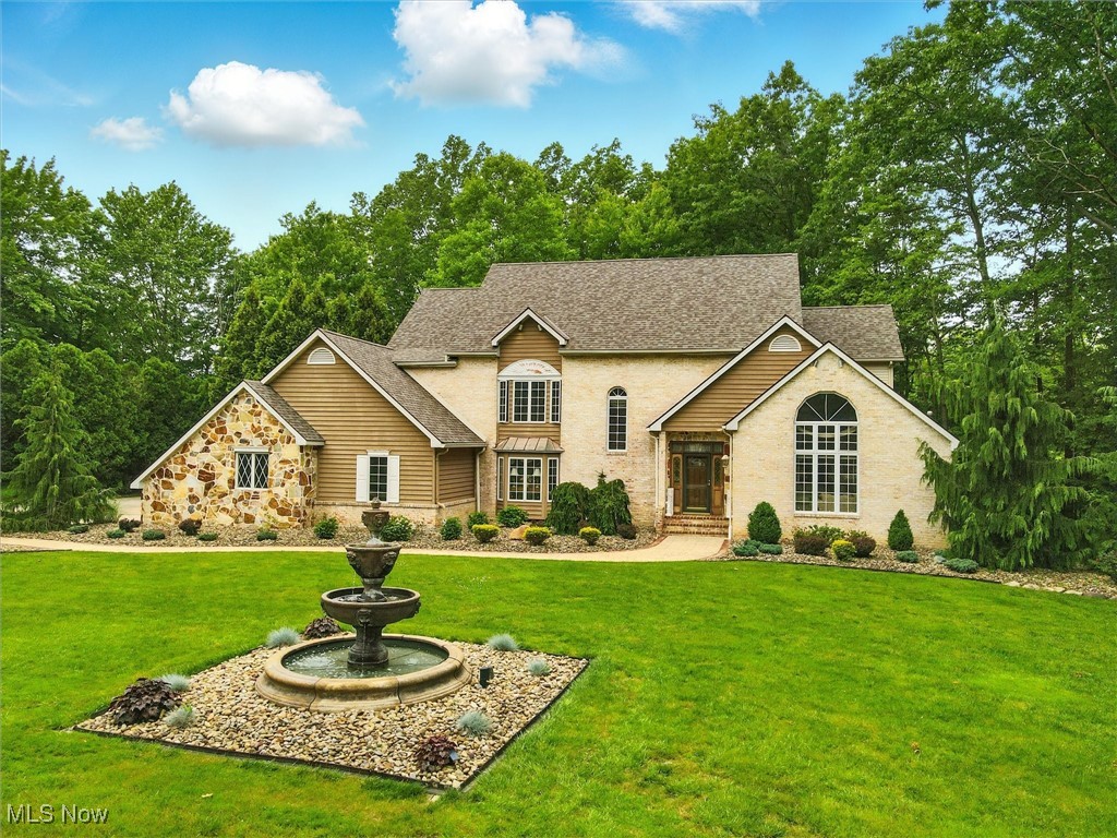 Wow! This elegant custom executive home is tucked away on a private cul de sac surrounded by nature with the Redbrook waterway behind! Built with quality, the home includes 2 x 6 construction with extra insulation in the walls and attic! The impressive grand entryway greets you and invites you to come in! From there you can access either the formal parlor with gas fireplace flanked in Italian marble, the large eat in kitchen with gathering nook and sliders leading to the back deck or the elegant dining room. The family room is just off the kitchen with a cozy gas fireplace and enclosed sun room. Upstairs are four large bedrooms with two full baths and numerous closets. The beautiful master bedroom has a huge master bath with whirlpool tub and large walk-in closet. The massive walk out basement is finished with a game room and wet bar area and two bonus rooms. In the backyard you will find a private courtyard leading to a pavilion with an attached garden shed. The home has a new roof with a 30 year warranty that was installed in 2024. Come see how this serene setting and absolutely gorgeous home is just perfect for you!