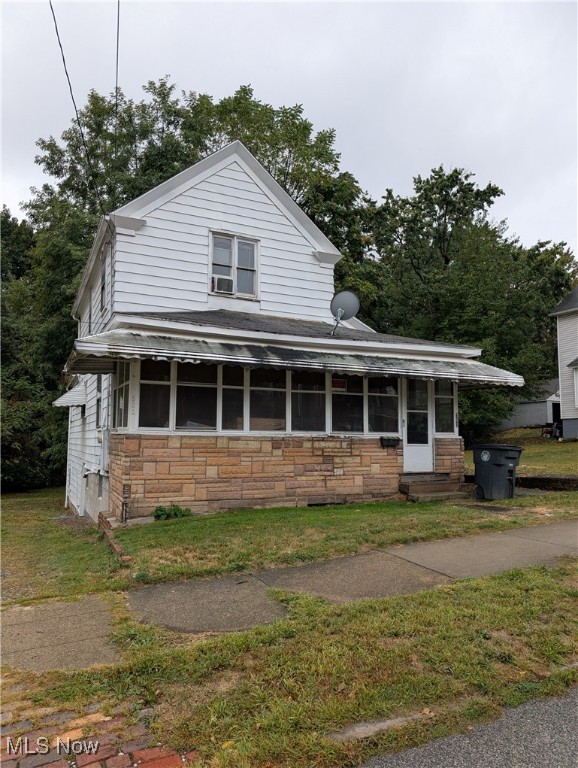 Tenant occupied with rent of $975 and the tenant pays all utilities. This house features an enclosed sunroom, living roon, dining room, kitchen, main floor laundry, three bedrooms, and two full bathrooms. The house is located on a quiet street within close proximity to both the University of Akron and Route 8. The unfinished basement is full but has double walkout doors to the backyard making it easy to access and use as storage or a workshop. Please do not disturb the tenants.
