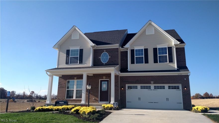 Beautiful new home with full brick and a partial porch on the front.  Inside you will enjoy an open floorplan with over 2,700 sq. ft. that has enough space for everyone in your family.  Entertain your guests in an oversized eat-in kitchen with Maple cabinets, granite countertops and oversized pantry.  The first floor also has a large Family Room, Dining Room and Living Room that could be substituted for a home office. The 2nd floor will offer you a large owner’s suite, his & hers walk-in closets and private bath with dual sinks and linen closet.  The laundry room, 3 large guest bedrooms and a loft will finish the 2nd level. A full walk-out basement will surely provide ample storage and endless future possibilities. Come walk thru this floorplan at our decorated home in The Preserve at Salt Creek community.  This community offers: Hudson school district, inexpensive Cuyahoga Falls utilities, a 10 year 50% tax abatement and quick highway access! This home can save you up to 30% on your m