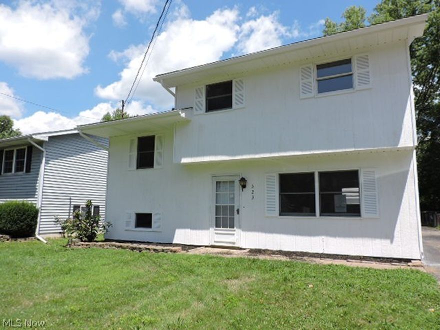 Frame and alum split level home. First floor living room and laundry/ mud room. Kitchen/ dining on 2nd floor and 3 bedrooms and full bath on 3rd level. Partially finished room on lower/ basement level. 2 car detached garage and paved drive.