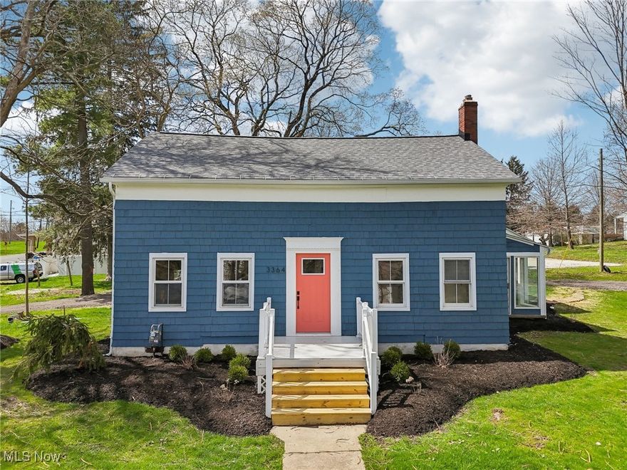 Located in the heart of Medina and within the desirable Medina School District, this completely renovated farmhouse beautifully blends restored character with modern updates. From the charming front porch to the bright and spacious foyer adorned with detailed millwork, every corner of this home has been thoughtfully enhanced!

The kitchen is a true showstopper, featuring quartz countertops, stainless steel appliances, gorgeous tile backsplash design, extensive cabinetry, and a convenient planning station.  It is bright and airy, while showcasing all the amenities of a chef’s kitchen.  The dining area flows seamlessly from the kitchen, ideal for everyday meals and entertaining.

Cozy up with a good book in the living room, which offers warmth and charm with wood beam ceilings, a built-in bookshelf, and access to the outdoors.

Entertain friends in the dramatic, two-story family room which boasts storage space, sliding doors to the yard, direct access to the all-season sunroom, and a vaulted ceiling with skylights and exposed beam.

Enjoy panoramic views and natural light year-round from the sunroom, complete with its own skylight and exterior access.

The laundry hook-ups are conveniently located on the first floor.  Take time to appreciate the tilework in the shower of the full bathroom downstairs before heading upstairs!

Upstairs, retreat to the primary suite which includes an ensuite bathroom with a tub, also enriched with decorative tile. Two additional bedrooms and generous storage space complete the second level.

Situated on a spacious half-acre lot, the yard provides room to enjoy the outdoors.

This bright, airy home is a rare gem - come see for yourself!
