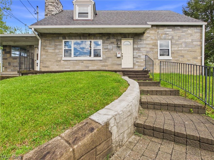 This 1942 masonry stucco home blends timeless character with an unbeatable setting overlooking the Worthington Golf Course. This classic home has an interesting history, having been built by the owners of the Worthington course, and its charming style matches the style of the club house. Inside you will find arched doorways and an amazing architectural detail called "barrel vault", where the living room walls curve up to and become the ceiling. An impressive stone fireplace with a unique mantle command the light filled living room. Step out from the eat-in kitchen to a deck overlooking "Hole 18". There is a unique grill-top in the kitchen for inside grilling. The laundry had been relocated from the basement to 1st floor, where a bedroom became a laundry room, and with a shower added, made a bedroom, full bath, and laundry all on 1st floor. Upstairs you will find 2 spacious bedrooms with full bath between. There is a whole-house fan. The chimney has been refaced with stone and capped/sealed on top. The full unfinished basement has a walk-out door to the back and an entrance to the garage. Part of the basement has an old tile floor that has been encapsulated. Importantly, foundation work has been completed, providing peace of mind and a solid starting point for future improvements. A prime and lovely golf course view, this home is across from the Catholic School and close to all other North End schools, shopping, and restaurants.