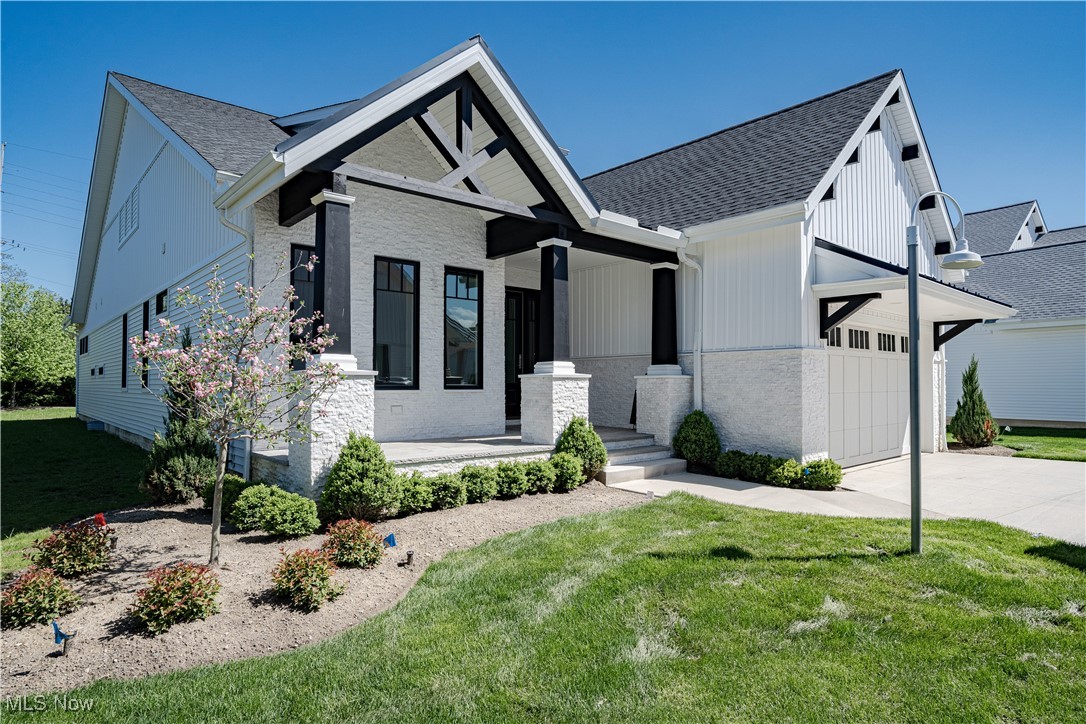 Experience the pinnacle of luxury living in this exquisite cluster home, crafted by one of Northeast Ohio's
premier custom builders, Kingdom Home Builders and elevated by the artistry of a renowned designer. Nestled in a
prestigious enclave on Cleveland's East Side, this residence seamlessly combines contemporary design with timeless
sophistication. Available for immediate occupancy, there is nothing to do but move in and start enjoying the lifestyle and
luxury of the Bridgeport Community. Some features you will adore are the custom-designed finishes that have been handselected, ensuring a cohesive and breathtaking aesthetic throughout the home. Expect a harmonious blend of rich
textures, natural materials, and impeccable craftsmanship. The gourmet kitchen is a chef’s dream, featuring top-of-theline appliances, bespoke cabinetry, and stunning quartz countertops that are as functional as they are beautiful. The
luxurious primary suite boasts two generous walk-in closets, a spa-like ensuite primary bathroom, complete with
oversized tile shower, and double vanity. In addition to the large guest room, office/flex space and a jack and jill full
guest bath, the Open Concept living is perfect for entertaining. The expansive living and dining areas feature soaring
ceilings, large windows, and elegant light fixtures that flood the home with natural light. The outdoor living provides a
soothing retreat with a beautifully landscaped patio for relaxing or hosting gatherings. Schedule your private showing
today and prepare to fall in love with the artistry and luxury that define this one-of-a-kind cluster home!