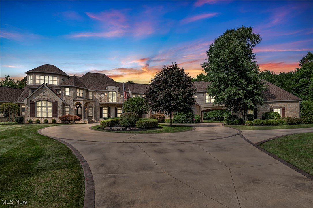 Magnificent 13,000+ Sq ft Estate plus impressive 1500 sqft, guest home (2 BD/2 BA, stone fireplace, loft, well-appointed kitchen, laundry, att. 1 car) all on a lush 10-acre parcel in prestigious Kirtland Hills. Main house with 6
bdrms, 7 full & 3 half baths, Privacy, security gate leads to this majestic, exclusive mansion w/welcoming décor
and handcrafted wood finishes for the discriminating owner, foyer with wood rounded entry door, piano rm
with white beams, 2 story great rm with handcrafted entertainment center and wall of windows, 2 well-appointed offices plus records rm, formal dining w/spacious butler's pantry, guest suite offering kitchenette,
connoisseur kitchen w/Thermador, Sub Zero, island, high-end features plus pantry, owners suite w/2 level
extraordinary closet plus his & her lavish bathrooms, enclosed sun lanai, upper outdoor decking overlooking the
pool, 3 convenient laundry areas,6 fireplaces, 17 course LL walkout w/billiard rm, wine cellar, mirrored exercise
center, stunning hand-carved bar that depicts the wine-making story, wood coffered ceiling, poker and family
room, ticket window w/artistic craftsmanship leads to the concession/beverage area that opens to a 16-guest
grand, state-of-the-art theater w/recline seating & karaoke stage, gift wrapping island, control center, craft/trophy
rm & safe room. Step onto the smooth elevator to whisk you to the bedroom level which also offers
game/gathering spaces, verandah, balcony overlooking great room and circular turret level graced w/window
seats. Outdoor kitchen overlooks tranquil pool w/sun shelf, bubbling fountain and hot tub, equipment shed,
manicured tiered landscaping, outdoor sound system & unique stone stage for entertainment, irrigation system,
parking for 8+ autos, circular valet driveway, property assistant tool bench, 62K house generator & security
system. Every meticulous feature for superior living has been integrated into this truly one-of-a-kind, exceptional
property!