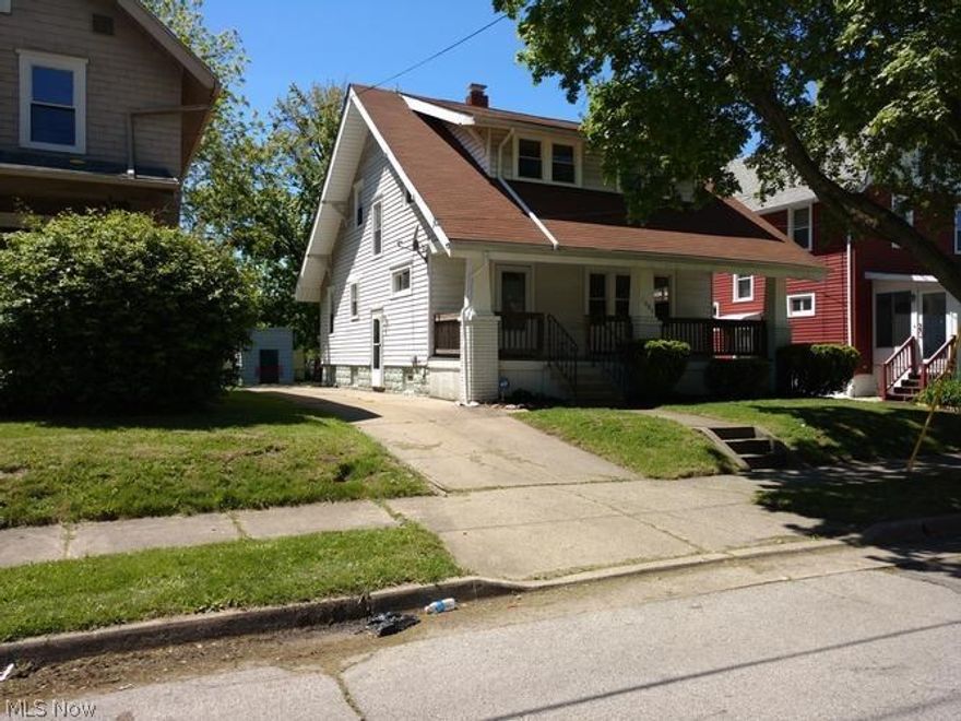 Enjoy lazy summer days on the front porch of this spacious 3 bedroom 1 and 1/2 bath colonial. Formal dining room, beautiful wood trim. Close to schools and shopping.