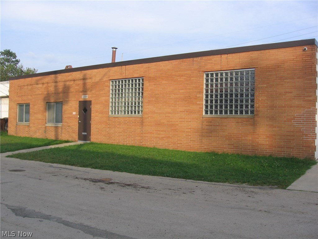 Well maintained all brick Industrial Building in a great location. Inside features 3-phase electric, 1 ton crane with two 10 ft. overhead doors. Building is approximately 2,400 square feet with 600 square feet of office and approximately 1,800 square feet of warehouse/shop area. Paved driveway on the outside leading to overhead doors. Call now for your private showing.