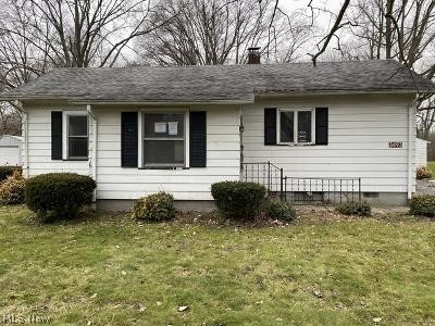 Cozy ranch sitting on almost an acre of land has living room, dining room, eat in kitchen, 2 bedrooms, full bath, partial basement, covered patio and 2 car detached garage.