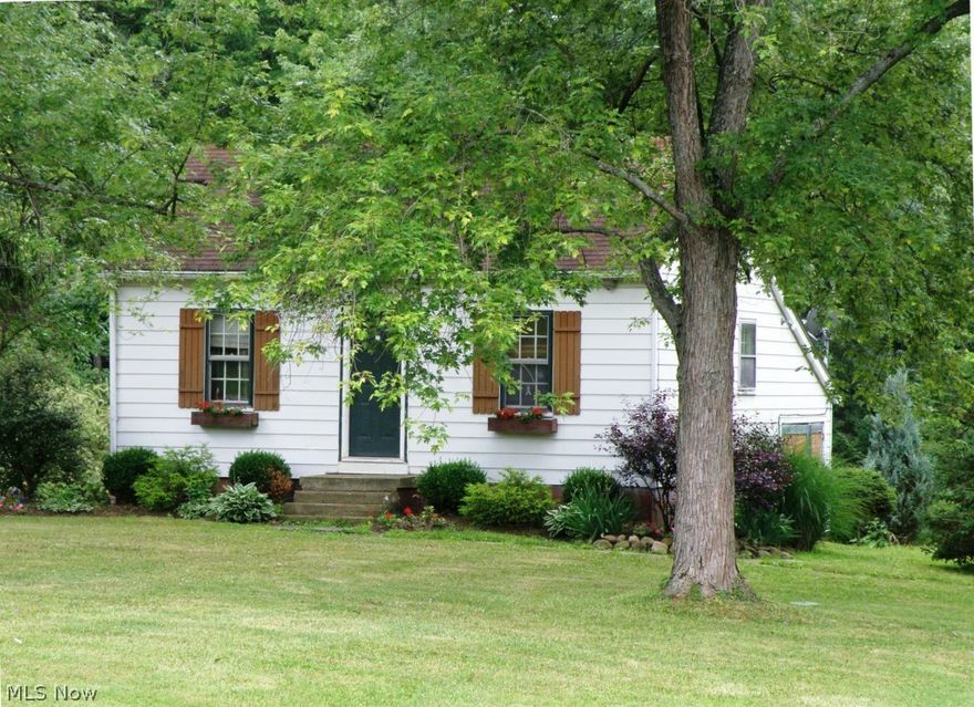 Four room cottage style with basement and 1 car garage. California minimalist palace in charming Weymouth area on one acre with a spring. Ready for your decorating touch and updating.