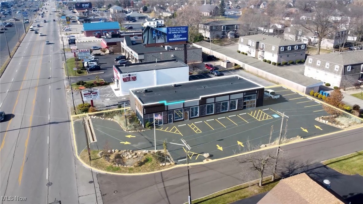 Welcome to a property strategically located at the heart of Boardman. Standing out amongst the bustling city nestled near the vibrant Boardman Mall this property enjoys proximity to premier shopping and entertainment making this location the epicenter of
commerce and connectivity along with an impressive average daily traffic of over 35,000 vehicles ensuring a steady flow
of potential consumers and clients spanning across an impressive lot offering almost 16,000 ft of space space and a 4,000 ft building which includes 15 parking spaces and three separate entrances as well as a High tech security system both inside and out keeping it safe while you're away soaring above you'll discover the Vibrant Community surrounding this prime location making
it the ideal business hub no matter your vision. Step inside to an elegantly designed space which has been tastefully modeled to include a luxurious office, bathroom, kitchen, and a spacious conference room all tailored for your business's success. Additionally the building's expansive layout offers a significant amount of undeveloped space providing ample opportunities to customize and adapt the premises to your specific business's needs Don't miss the opportunity to make this yours... the future of your business
starts here! https://youtu.be/tvL4GY2RN-I?si=4FZHn5RHHRuguAMl