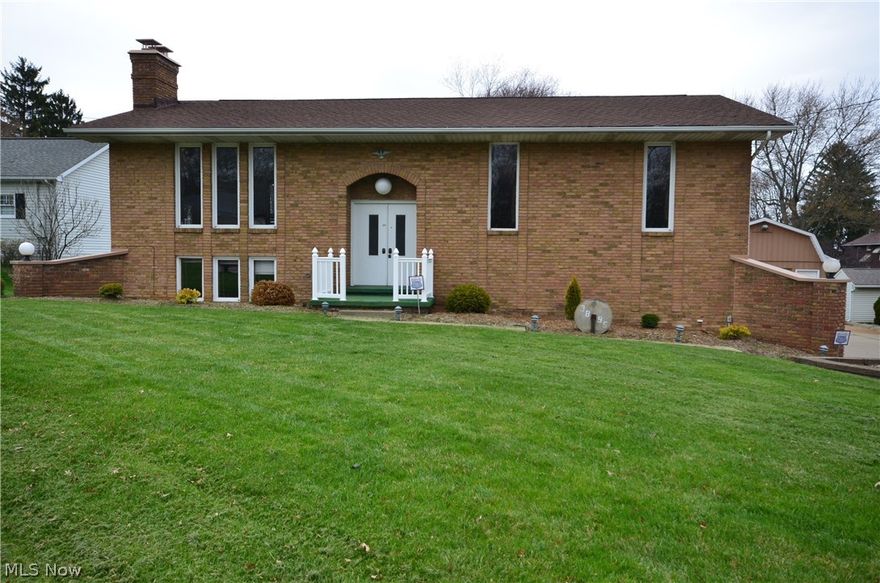 Impressive all brick home with 2 car attached garage plus additional detached garage and shed. Two fireplaces, wood insert in family room fireplace will heat home.  Rear deck off dining area, sun room off family room and bar area on the lower level.  Appliances stay, home is ready to move in.