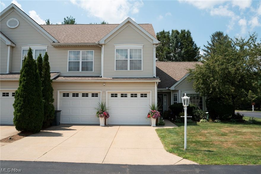 Welcome to 2800 Hartford Lane! This gorgeous 3 bed/2.5 bath condo located within the Ridges of Camden Park in Green is ready for you to call home. As you enter the front door, into the foyer you'll notice the beautiful bamboo flooring that flows through the kitchen and into the dining and living room areas. The remodeled kitchen (2021) boasts granite countertops, crown molding, stainless steel appliances and custom backsplash. The dining and living room areas offer plenty of space for entertaining and feature vaulted ceilings, beautiful light fixtures, a gas fireplace and bamboo flooring. Access to the back patio is off the living room and features a concrete patio perfect for sipping your morning coffee or sharing an evening glass of wine with friends. Down the hall you'll first find the office, with views out into the backyard, and the owner's suite. The bedroom features newer plush carpeting, a new ceiling fan, a walk-in closet and a second closet as well. Enter into the bathroom and you'll find brand new flooring, vanity w/ granite countertop, a walk-in shower and separate tub. Two coat closets, the laundry room and a half bath round out the first floor. Heading upstairs you'll find new carpeting on the staircase and in the loft area. Each spacious bedroom features its own walk-in closet, updated lighting and ceiling fans and plush carpet. The main bathroom features new flooring and an updated vanity. Other updates include the roof and skylights (2020) and HWT (2021).