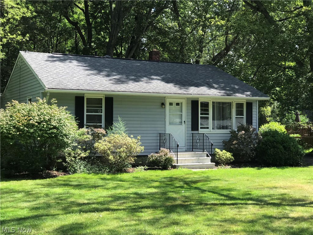 This beautiful home is waiting for you!! Set back on almost a half acre of land, surrounded by trees to bring shade, is this spacious, well maintained Ranch in the heart of Mentor, Ohio! As you walk in the home, you are amazed by the gorgeous wood flooring in many of the rooms. The floors actually shine!! The home features a spacious living room, a kitchen with plenty of storage space, and a LARGE family room, perfect for entertaining or just hanging out with the family. The sliding glass doors lead you to a newer backyard deck that was built in 2017. This home is located on a very quiet street with quick access to schools, shopping and the freeway!! Come quick!! This home won't last!!