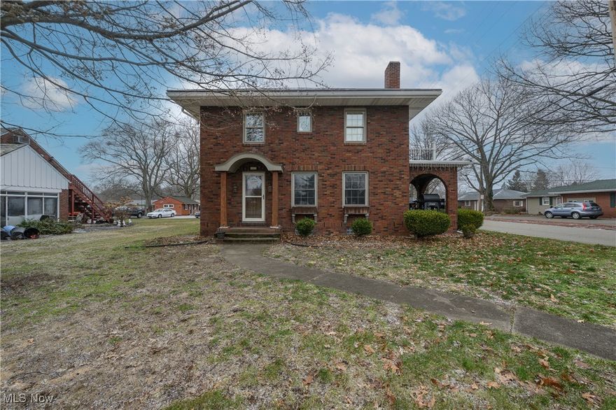 Elegant brick residence located on the desirable south side of New Philadelphia. This beautifully cared-for home features a premium metal roof installed in 2018 and updated plumbing throughout, offering both style and long-term reliability. The interior showcases 3 bedrooms, 2.5 baths, and a partially finished basement ideal for refined entertaining, a private retreat, or additional living space. Timeless craftsmanship paired with thoughtful updates makes this home a rare find in a sought-after location close to schools, shopping, and parks. All kitchen appliances will stay, allowing for an easier move.  Two-car detached garage, fenced-in yard with shed for family and pets. Updated hot water tank 2018. Don’t miss this solid, move-in-ready home.