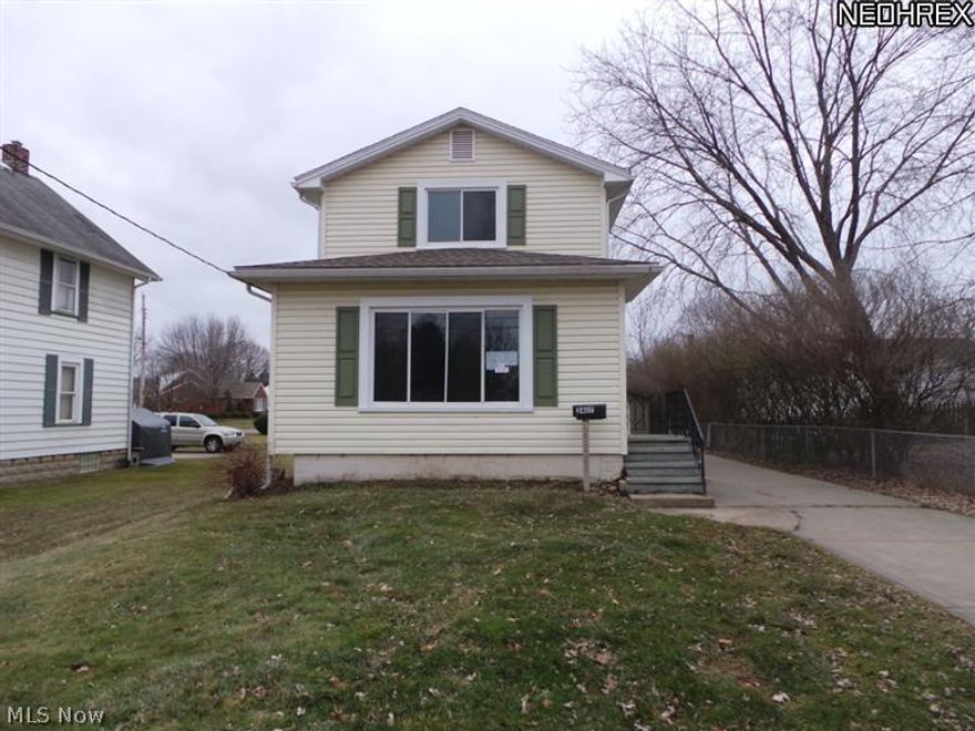 Two, possible three, bedroom bungalow offers large living area. Third bedroom could be used as office or bonus room. Lots of natural wood. Needs some TLC. PRICED TO SELL!!!  Don't miss out!!  Property sold AS IS.