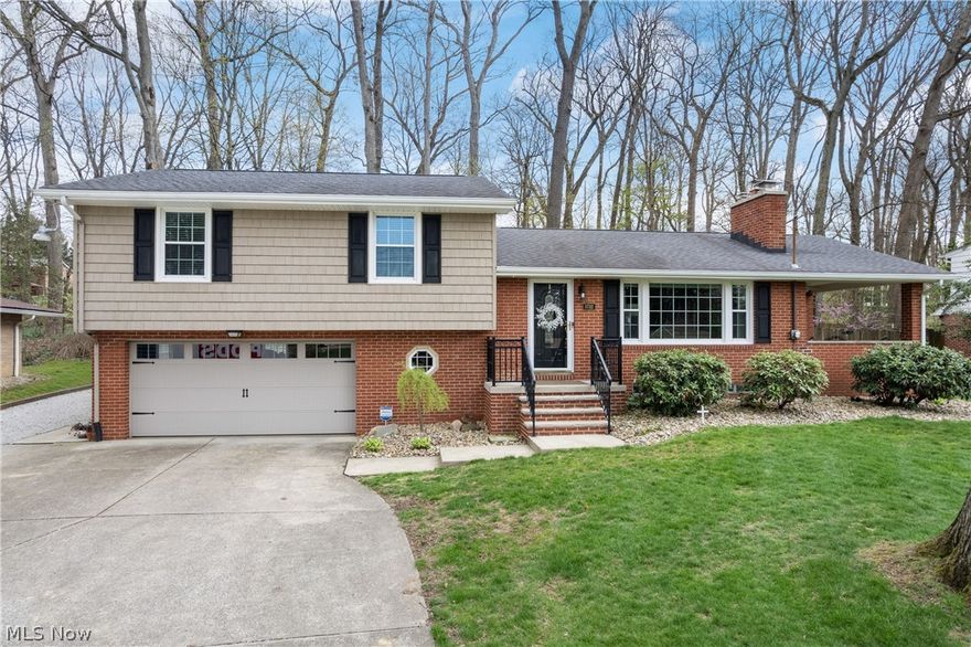 Step into comfort and style with this beautifully updated home in Perry Township. The spacious layout includes a welcoming living room with a cozy fireplace, along with a dedicated dining area ideal for family meals or entertaining.  The thoughtfully designed kitchen is complete with appliances, granite countertops and plenty of workspace.   The property features three bedrooms, each with beautiful hardwood flooring. The primary bedroom offers both his and hers closets as well as a private ensuite bathroom.   A 2nd full stylish bathroom is off the 2nd floor hallway.  The lower level offers a rec room with fireplace, a 3rd full bathroom, a laundry area and lots of storage space. Enjoy outdoor living with a charming side brick porch and a fully fenced-in backyard. The oversized garage provides ample room for vehicles, storage, or even a workshop.  This home has been meticulously taken care of and it shows - it's ready for you to move in and make it your own.