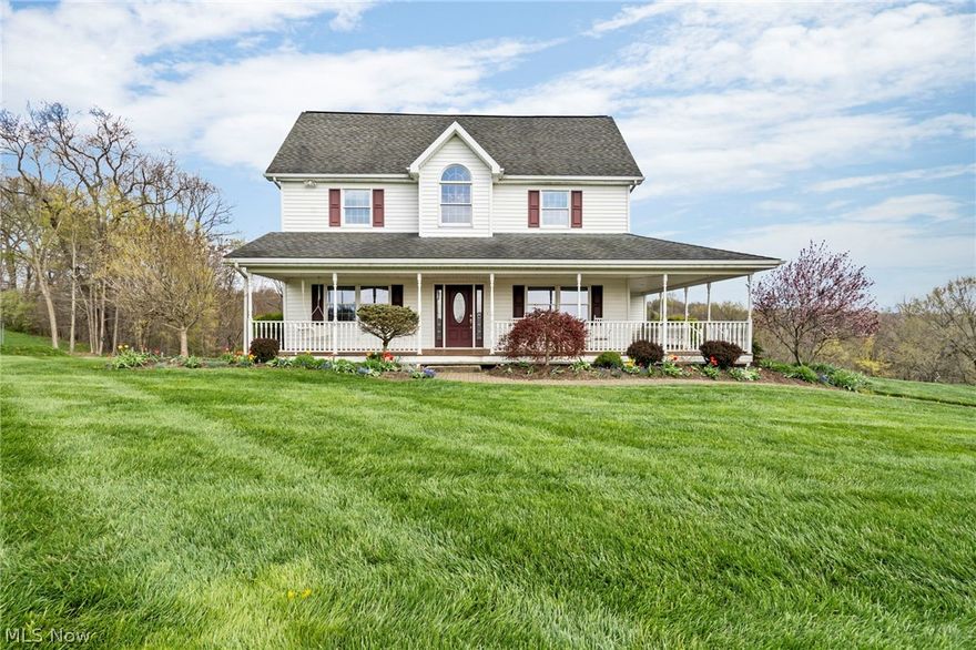 Enjoy life in the country, away from the hustle and bustle, when you move into this beautiful 4BD, 2BA, custom built home with a gorgeous wrap around front porch, situated on 20.6 picturesque acres. You'll enjoy a warm welcome when you feel the heated tile floor in the mudroom! From there you'll enter into a big, open, eat-in kitchen with Kraftmaid cabinets, under cabinet lighting, lots of counter space, appliances, and 3/4" hardwood floors which continue on into the formal dining room which is currently a den. Very large and lovely living room with lots of windows and a gorgeous solid wood staircase. Home office is great for those who work from home or students with homework. First floor laundry with full bathroom and tiled floors. Solid 6 panel doors throughout the house. Upstairs you'll love the unique layout, the gorgeous front window seat area, 4 bedrooms and 1 spacious, full bathroom. Large master with 2 walk in closets (one currently used for storage). Full walk out basement. Ou