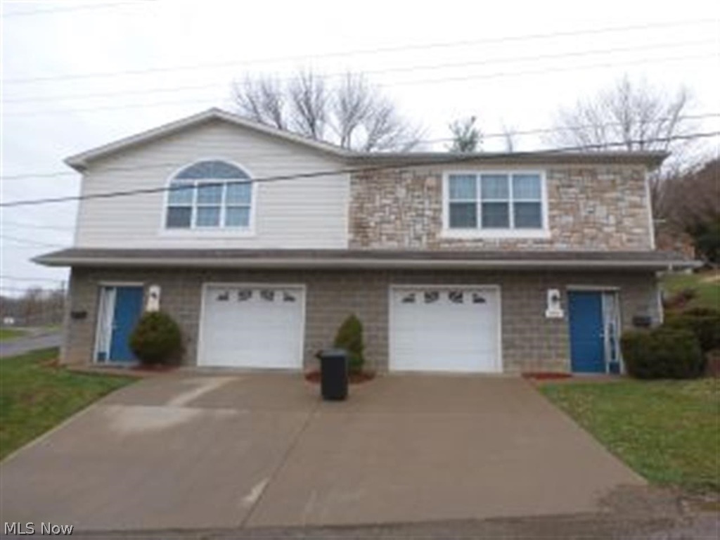 Nice Duplex with both units occupied. Gas fireplace in both units. Cathedral ceilings. 1 extra large garage in each unit. Range, refrigerator, garage disposal, washer and dryer come with the units. One unit has a patio and the other a deck. All of this on a corner lot