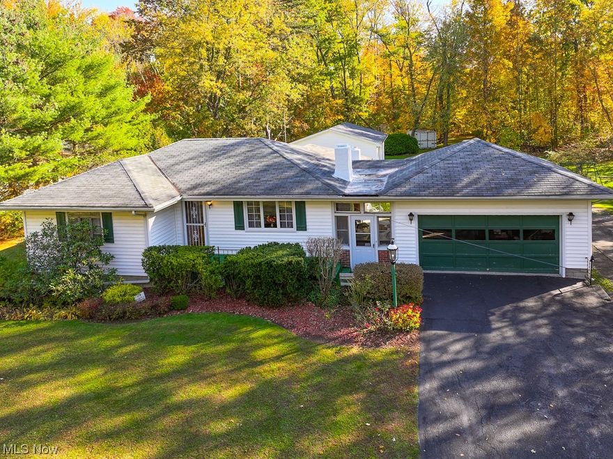 * NEW * Very Nice and Well-Kept 3 Bed / 4 Bath RANCH w/ 2 Acres in Madison / Stunning Wooded Lot / w/ Finished Basement / 2 Car Attached Garage w/ Built-In Workbench and Cabinets / PLUS Additional BONUS 720 sq. ft. Fully Equipped Outbuilding * Breezeway Entry w/ Front Porch / Double Driveway to 2 Car Attached / Bonus Driveway to the Rear of the Home connecting the Oversized 2 Car Additional Garage w/ TONS of Finished Space / Additional Parking / Back Porch and Patio Area connect to Breezeway w/ Glass Slider and Attached Garage * Eat-In Kitchen w/ Knotty Pine Accent Wall / Custom Built-In Bench and Corner Pantry * Formal Living Room w/ Large Front Three Paneled Picture Window / featuring Brick Gas Fireplace * First Floor Master Bedroom w/ attached Half Bath * THREE Bedrooms on the First Floor / 3rd Bedroom FLEX ROOM currently Set up for Dining Room * Additional Full Bath on the Main Floor * FINISHED Recreation Room in Lower Level for Entertaining w/ Additional Full Bath * LARGE Utility Room on Lower Level w/ over 475 sq. ft. of Space to Utilize * Finished Laundry Room w/ Built-In Cabinets and Countertops * MASSIVE SECOND 2 Car Garage w/ Driveway Access / Additional Parking / Half-Bath / Heat Hook-Up / Electric / Water / Insulation / Built-In WorkSpace and Cabinetry / STUNNING Private Retreat * BREATHTAKING Lot to Walk and See / Private and Wooded / Storage Shed * New Furnace and New Electrical Panel * Home conveys with additional 1 Acre Buildable Parcel Next Door * MUST SEE *