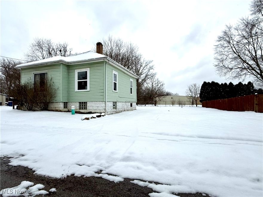 This adorable home has so much to offer! Situated on a quiet dead-end street with an oversized yard, the main level features a living room with dining space, kitchen and two bedrooms. The finished basement has a full bath and a bonus room. It is a great opportunity for a first-time home buyer or investor. Move in ready! 1 Year Warranty!