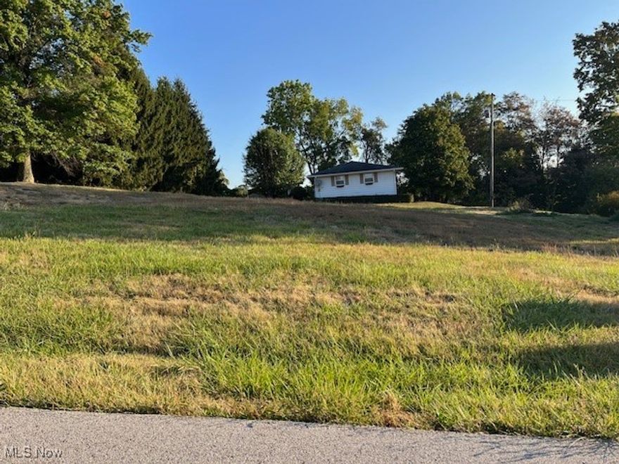 Very nice building lot for residential or commercial construction. The property is located close to I-70 for easy access to the Mall, Plaza, or medical assistance. The septic System is installed  and County water Tap is in place. This property is ready for your new construction and close to everything. No mineral rights transfer. Lot is residential or Commercial.