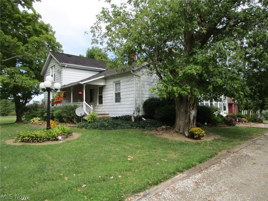 Quaint & charming farm house on 34 remarkable acres-20 in hayfield, 3 wooded & the 6 ac pastures are tiled every 20'! Great opportunity to have your very own sustainable rural farm! Farm your tillable fields & continue to take advantage of the CAUV program to keep your taxes at a lowered rate. Great location in a quiet rural neighborhood-and nice access to Rt. 90 & Rt. 6 for easy commutes. HUGE 6 car garage (new metal roof in 2013) w/chain lift offers plenty of room for your vehicles, mowers, trailers & farm equipment-attached finished 32X18 room on the back is extra space for working out, hobbies, party room-you decide! This former alpaca farm offers 6 fenced (professionally installed 5' tall no climb) pastures for easy separation/rotation & has 3 run-in shelters (2-30x11 w/5’ overhang, 1-12x8). 34x48 barn offers plenty of stall & hay storage space . Hay elevator & automatic waterers in barn & run-ins stay! In addition, as you come off the deck from the kitchen, the large 240x70 fence