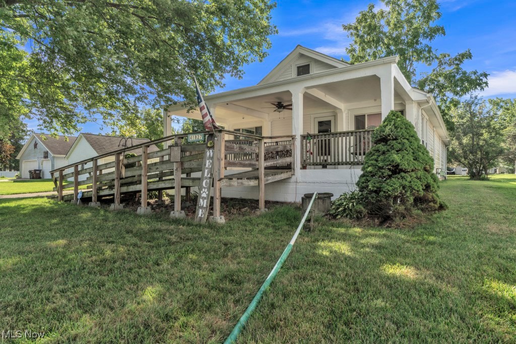 This adorable ranch-style home offers easy, single-floor living with tons of potential! It has 2 bedrooms with a cozy office that could easily serve as a third bedroom, plus a walk-up full-sized attic—perfect for storage or future expansion. Basement access is through the garage, 1040 sq feet ready to be finished. In addition to the attached garage is a 2 car detached garage, perfect for the hobbyist, one who likes to tinker or equipment storage. Enjoy the peaceful outdoor space with mature grape vines in the backyard and apple trees in the front. The freshly painted front porch includes a handicap-accessible ramp and is fully gated for privacy and security. Conveniently located close to highways, shopping, banks, and churches—this home offers both comfort and accessibility. But that's not all—this property includes two additional parcels, bringing the total lot size to approximately 3/4 of an acre. With access to electric, gas, and water, there's incredible potential to build at the rear of the lot with access to Lawrence Street. Brand new A/C unit and the Furnace is 6 years old with a new chimney liner. This is a great opportunity to own a versatile property with room to grow! Come to the open house and take a look!!