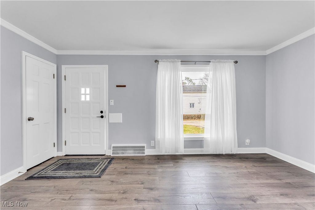 Photo of 19205 Pasnow Avenue, Euclid, OH 44119 (MLS # 5182041)