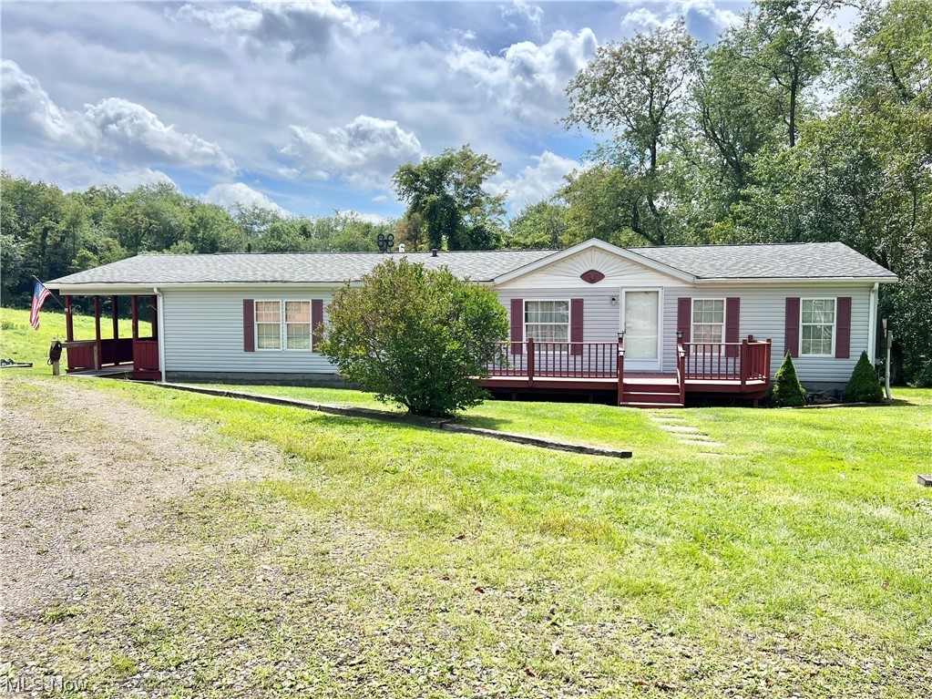 17.75 ACRES OF FOR PRIVACY, TRANQUILITY AND OUTDOOR ADVENTURES! This 3 bedroom, 2 bath ranch is located in New Cumberland with endless possibilities for that beautiful acreage. The home is one level living that features an open floor plan that includes a casual living room, eat-in kitchen, 3 bedrooms, 2 baths and a laundry room for added convenience. There's a deck, spacious 2 car garage and an older barn for storage or work area. Breathe in the fresh air, whether stargazing under the night sky or drinking your morning coffee, this outdoor space may be an oasis just waiting for you! A rare find in today's real estate market--call today!
