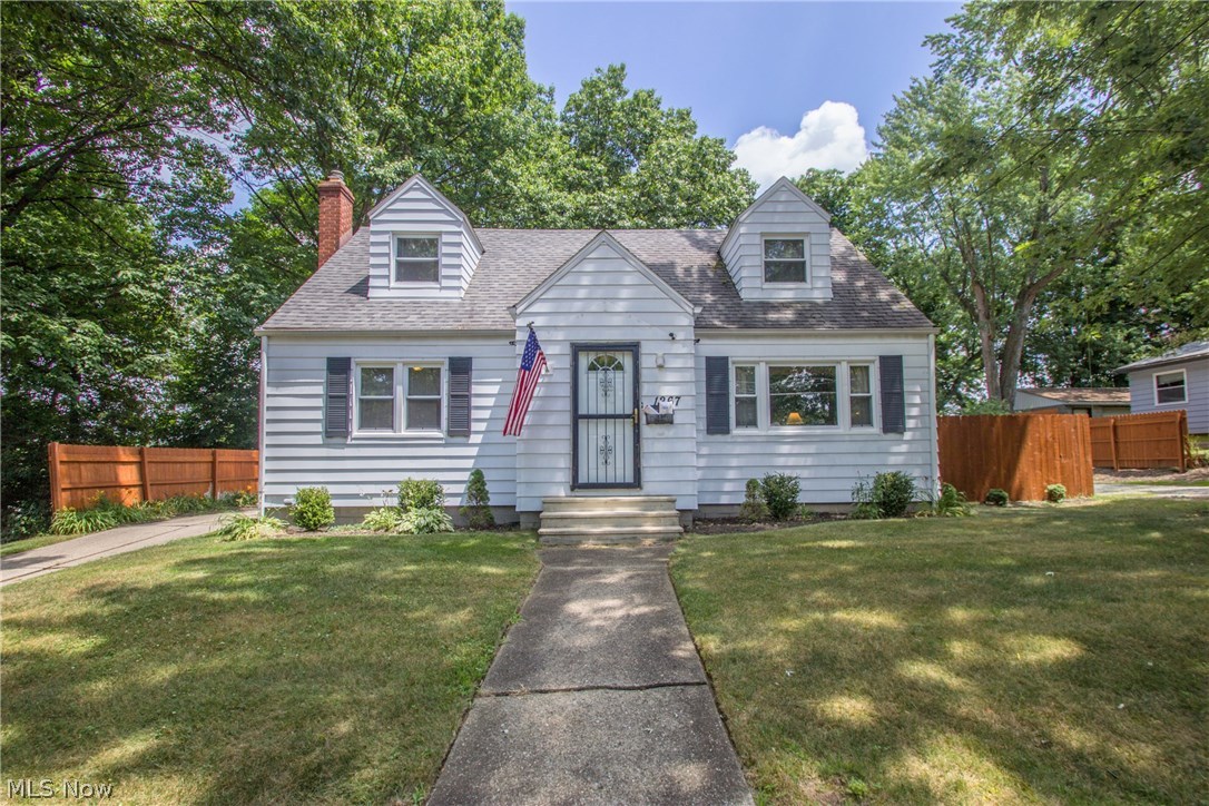 This wonderful 4 Bed, 2 Bath Cape--private & tucked away on a quiet street yet convenient to Gorge Metropark, Chapel Hill shopping, restaurants & highways-- boasts updated kitchen w/ ceramic, replacement windows, newer 2nd floor carpet , privacy fencing, newer roof, MORE! Second floor bath as well as bedrooms have been remodeled and supplemental electric baseboard heat added. Finished lower level family room provides an additional 400 sq. ft. of overall living space. Original hardwood in main floor bedrooms and under carpet in living room. Enjoy the convenience of the horseshoe drive around house & TWO oversized 2-car garages with substantial additional sq. ftg. for storage. One garage measures 24x32 w/ new lighting, water, heat and 220V! Updated electric panels in both garages and house with added generator panel. Newer water tank. Sale includes 3 parcels, providing added privacy, green space and space for guest parking. One-year home warranty provided by seller for buyer! Welcome to