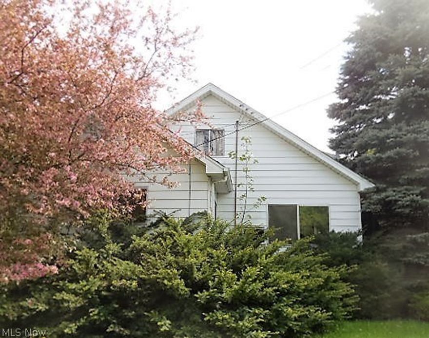 Looking for unique? Here you go. This property is 3 parcels; including what used to be a floral shop (now condemned). The 3 parcels total over an acre so if your looking for land- this is it. MLS taxes are only for 1 parcel. Parking for the home is also the parking lot for the old floral shop. This will probably take some time to clear and turn into your dream, but at this price it is well worth it.  Property is being sold “as is”. Cash buyers need verification of funds.  Renovation loan buyers need a letter of approval.  Earnest money must be certified funds and is to be deposited with the listing office.  Buyer or buyer’s agent responsible to check with Building, Zoning, EPA, DEA, Tax Department or any other requirement for intended use. City orders are in supplements and must be signed and included with all offers.