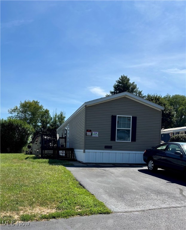 Enjoy low-maintenance living in this well-maintained ranch-style home located in the Fox Run Mobile Home Community in Mogadore! This 3-bedroom, 2-bath home has been lovingly cared for and offers a spacious, functional layout. The primary bedroom includes a large en suite bath, while the open-concept kitchen flows seamlessly into the living room, perfect for both everyday living and entertaining. Two additional bedrooms and a second full bath are located on the opposite side of the home for added privacy. Call today before it's gone!