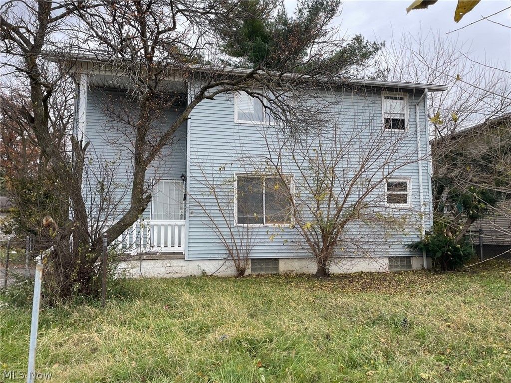 Photo of 3029 E 73rd Street, Cleveland, OH 44104 (MLS # 5203859)